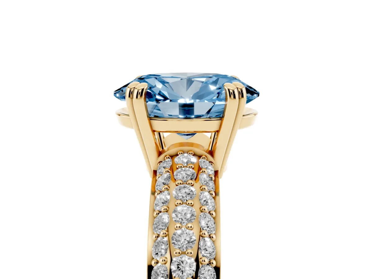 Fancy Blue Oval Cut Diamond Solitaire Ring with Multi-Row Round Pavé Band and Prong Setting Yellow gold
