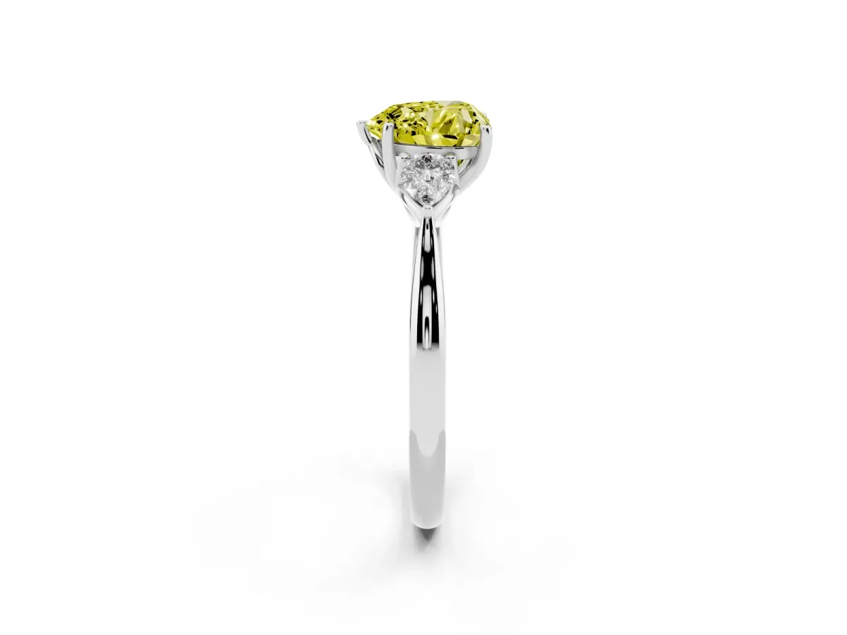 Fancy Yellow Three-Stone Heart Cut Diamond Ring with Pear Side Stones in Four-Prong Setting Silver