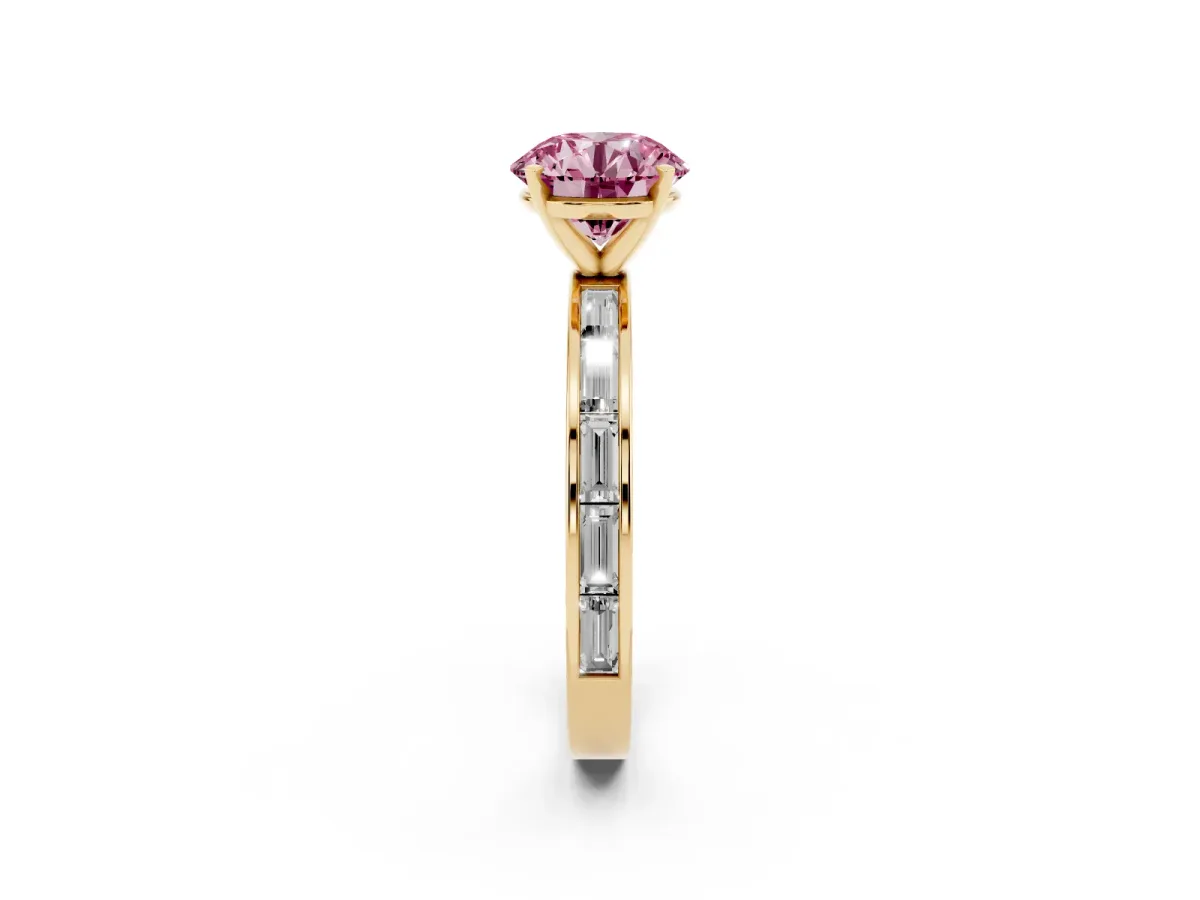 Fancy Pink Round Cut Solitaire Diamond Ring with Channel-Set Baguette Band and Four-Prong Setting Yellow gold