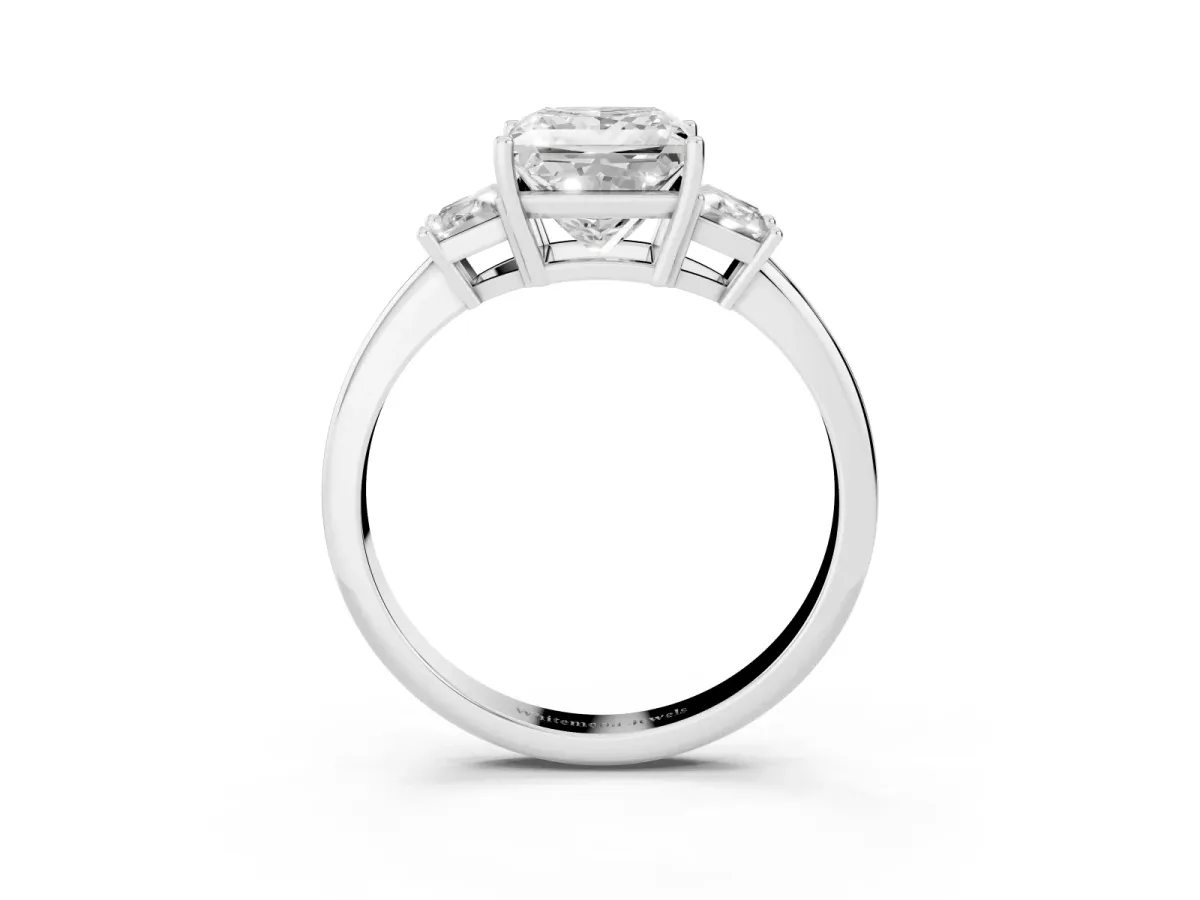Princess Cut Diamond Three-Stone Ring with Trapezoid Side Stones and Prong Setting Platinum