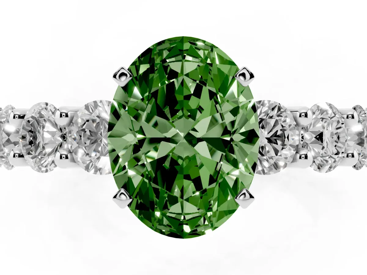 Fancy Green Oval Cut Diamond Prong Setting with Side Stones on a Pave Band Silver