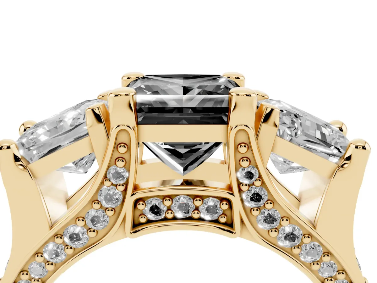 Fancy Black Princess Cut Diamond Three-Stone Ring with Channel Set Band and Four-Prong Setting Yellow gold