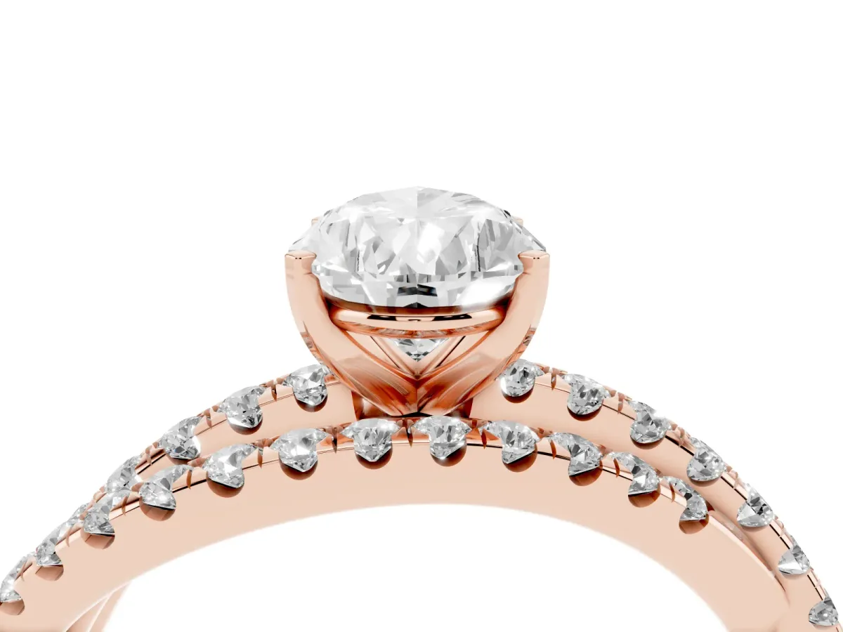 Pear Cut Solitaire Twist Band with Pavé Setting and Four-Prong Setting Rose gold