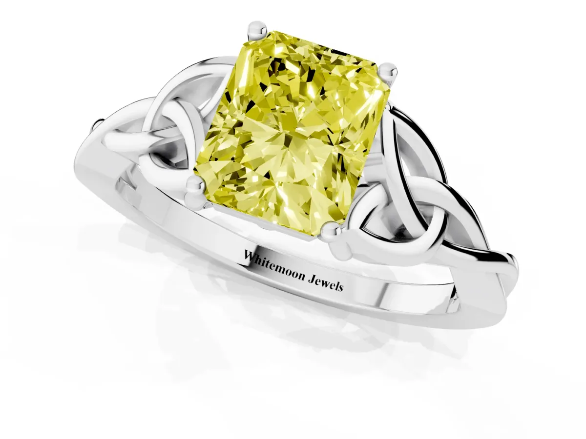 Fancy Yellow Radiant Cut Diamond Solitaire Engagement Ring with Celtic Knot Band and Four-Prong Setting White gold