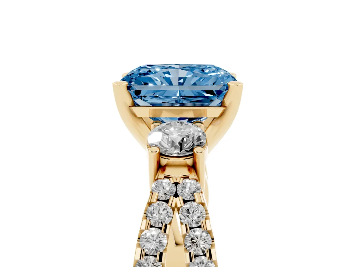 Fancy Blue Radiant Cut Diamond Three-Stone Ring with Pavé Split Shank and Four-Prong Setting Yellow gold