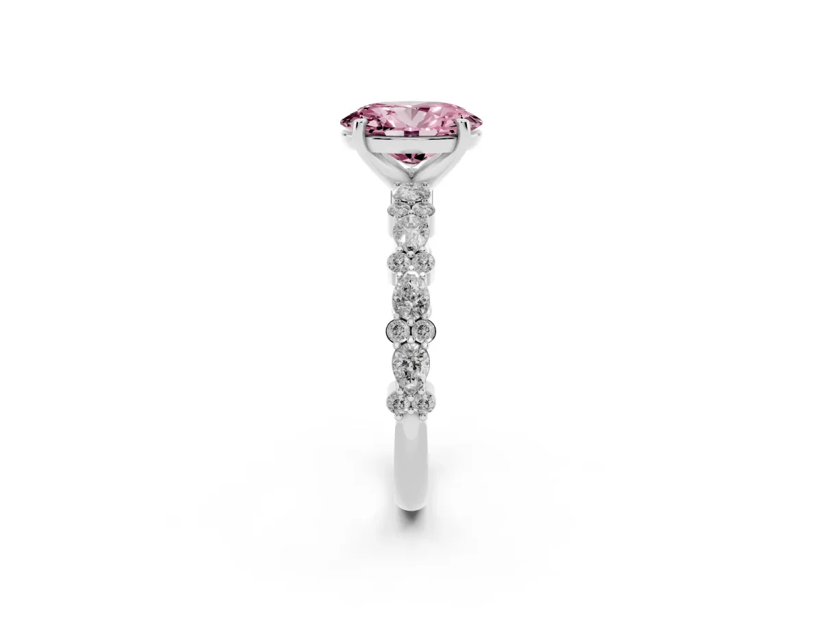 Fancy Pink Oval Cut Diamond Side Stone Solitaire Ring with Round and Four-Prong Setting Platinum
