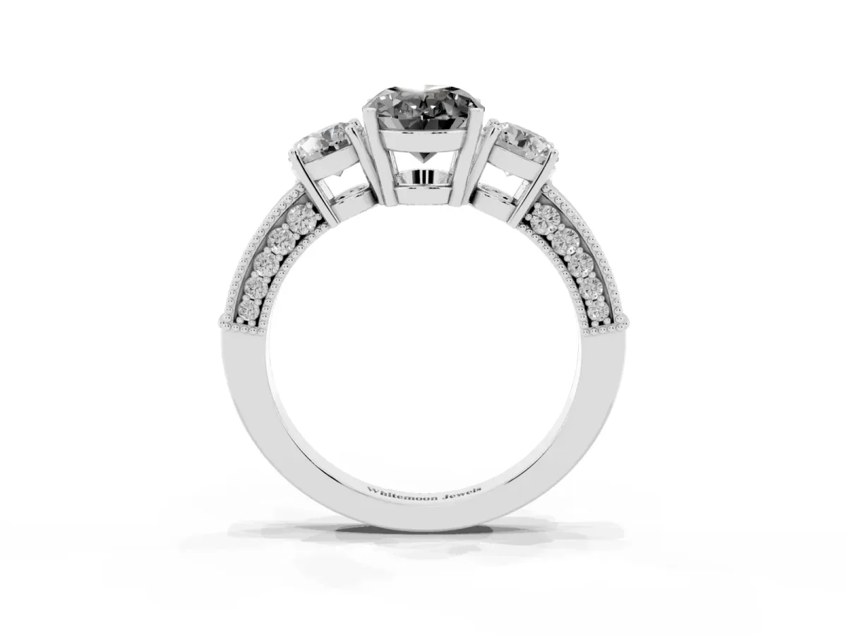 Fancy Black Oval Cut Three-Stone Diamond Ring with Pavé Band and Four-Prong Setting Platinum