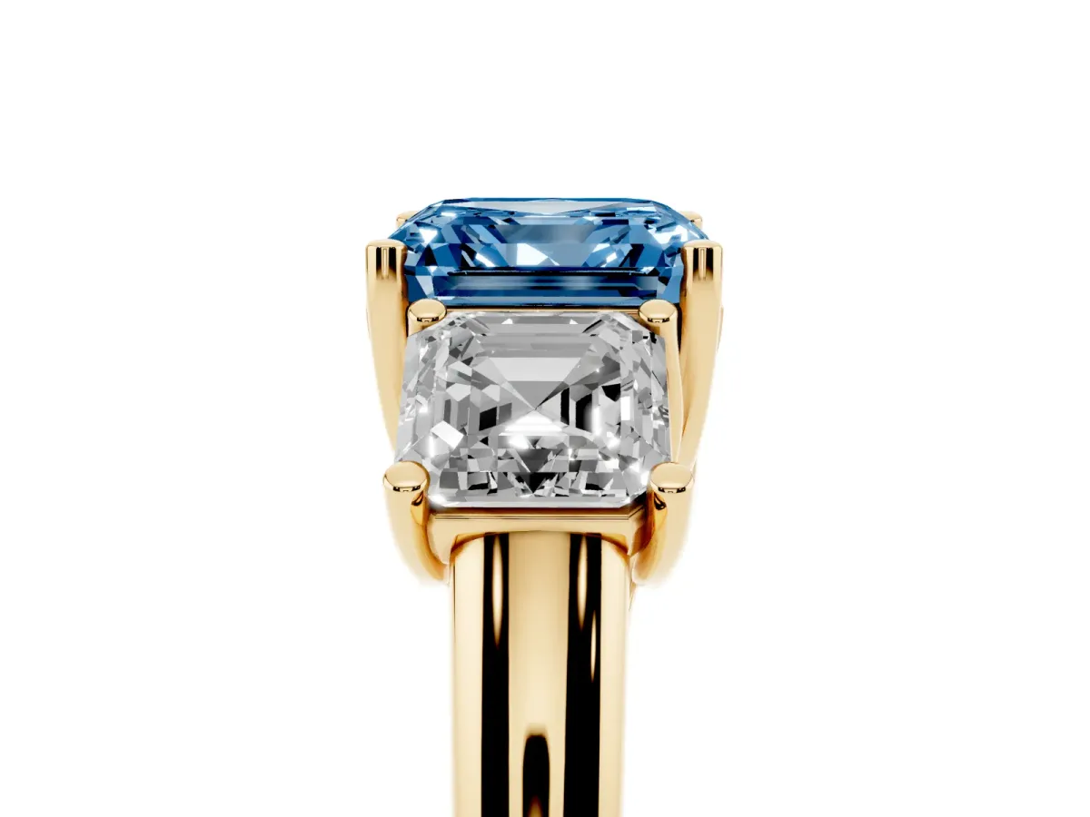 Fancy Blue Three-Stone Asscher Cut Diamond Engagement Ring with Prong Setting Yellow gold