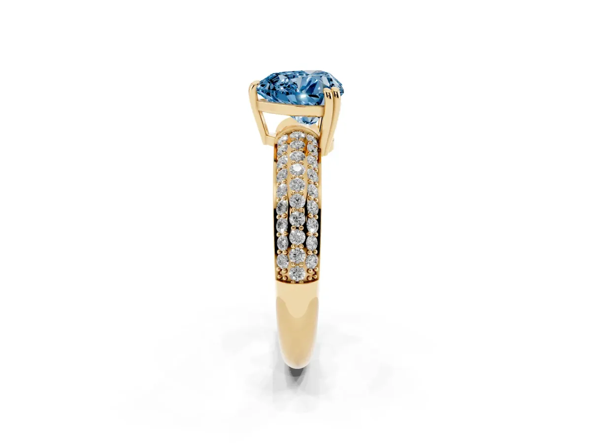 Fancy Blue Heart Cut Diamond Solitaire Ring with Multi-Row Round Pavé Band and Prong Setting Yellow gold