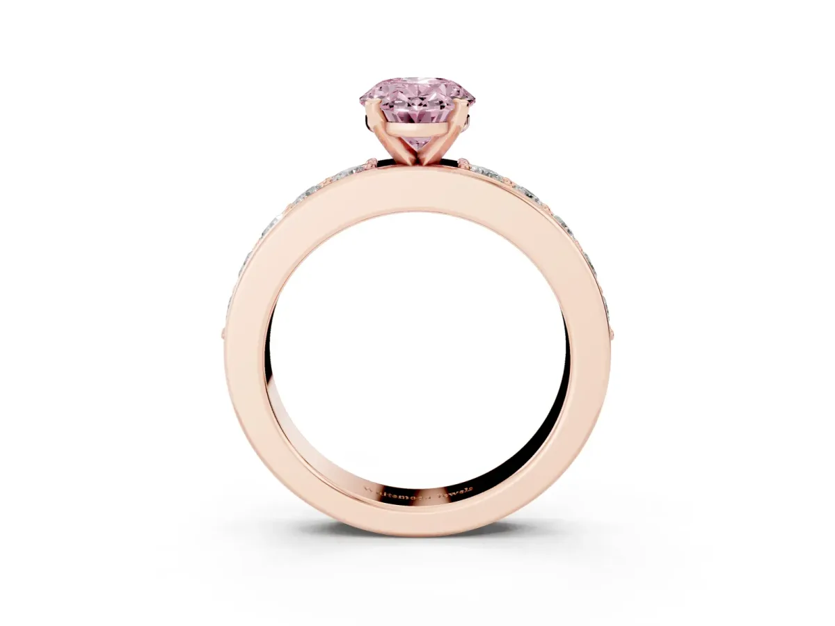 Fancy Pink Oval Cut Diamond Engagement Ring with Channel Set Round Band and Prong Setting Rose gold