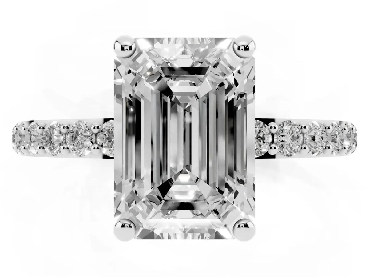 Emerald Cut Diamond Solitaire Ring with Round Pavé Band and Prong Setting Platinum
