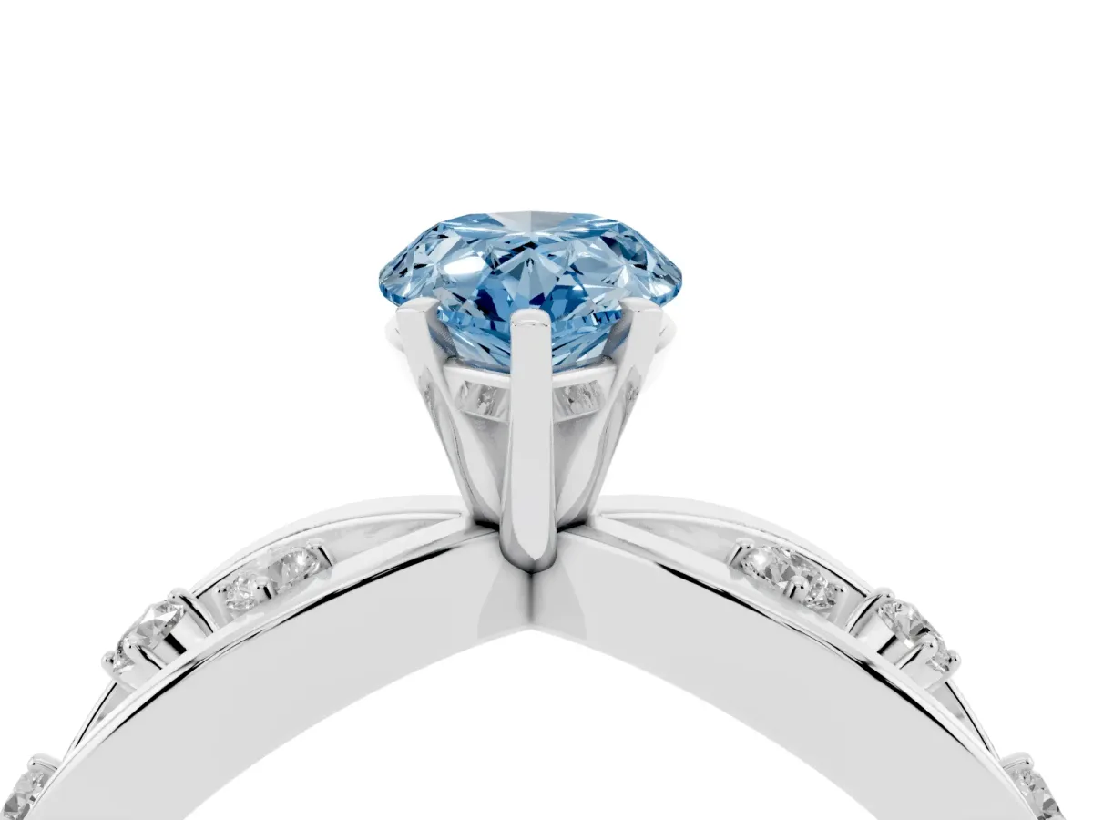 Fancy Blue Pear Cut Cut Solitaire Diamond with Side Stones on Criss-Cross Band and Four-Prong Setting Silver