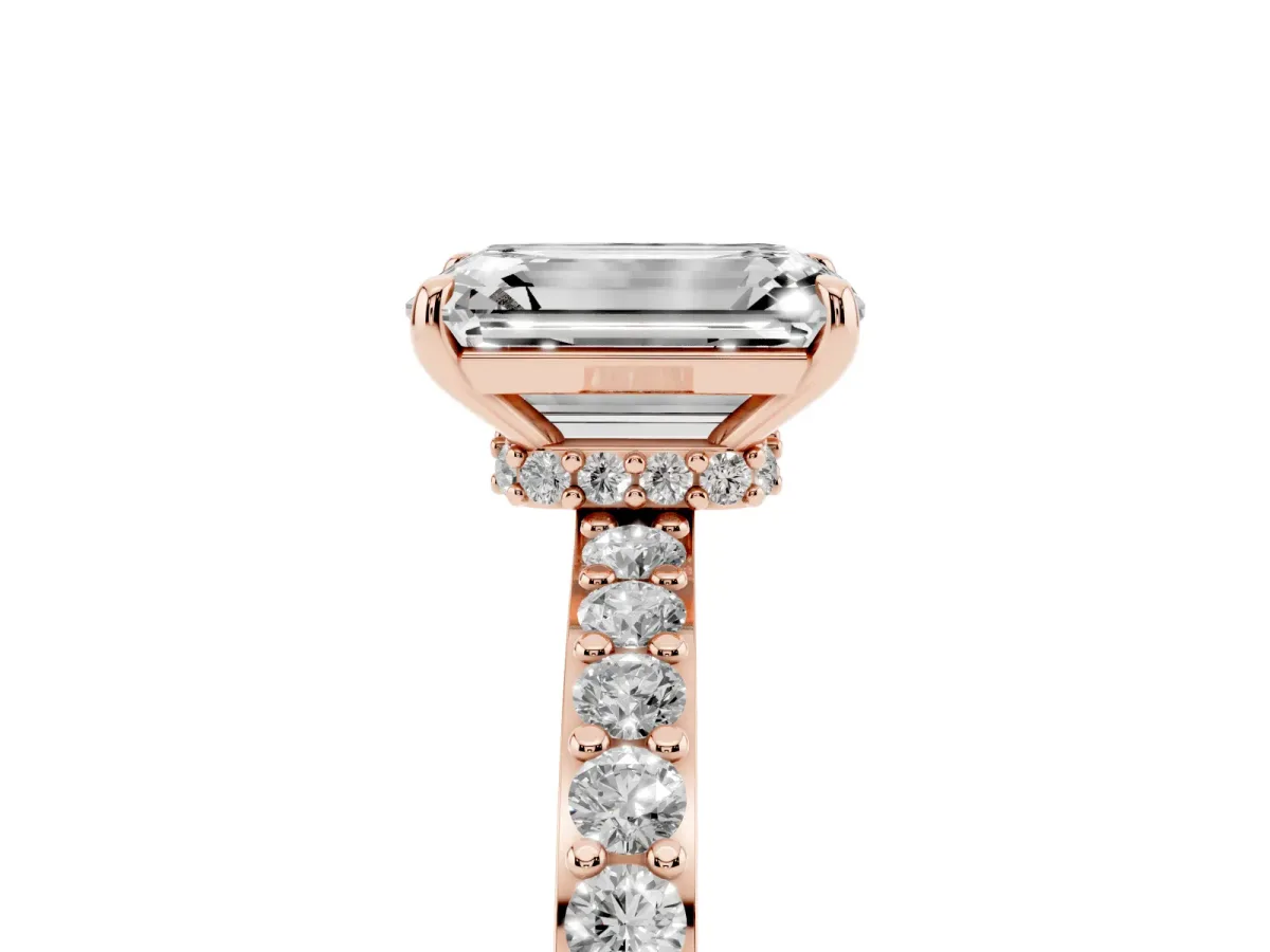 Emerald Cut Diamond Solitaire Engagement Ring with Pavé Band and Four-Prong Setting Rose gold