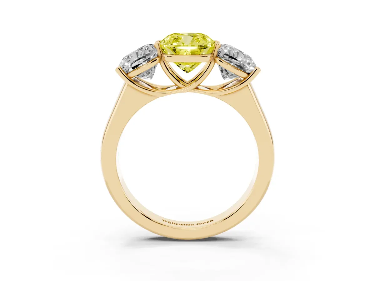 Fancy Yellow Cushion Cut Three-Stone Diamond Ring with Prong Setting on a Classic Band Yellow gold