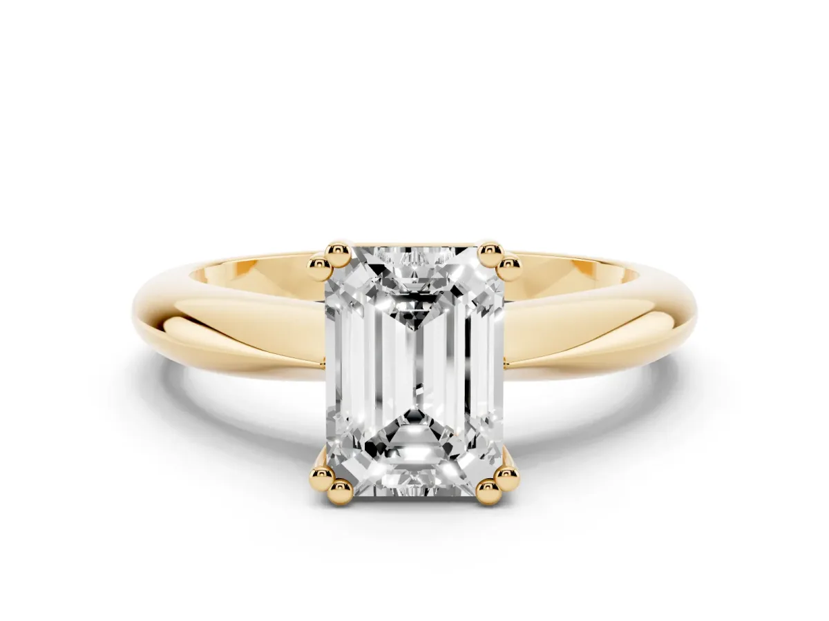Emerald Cut Cut Solitaire Engagement Ring with Tapered Band and Four-Prong Setting Yellow gold