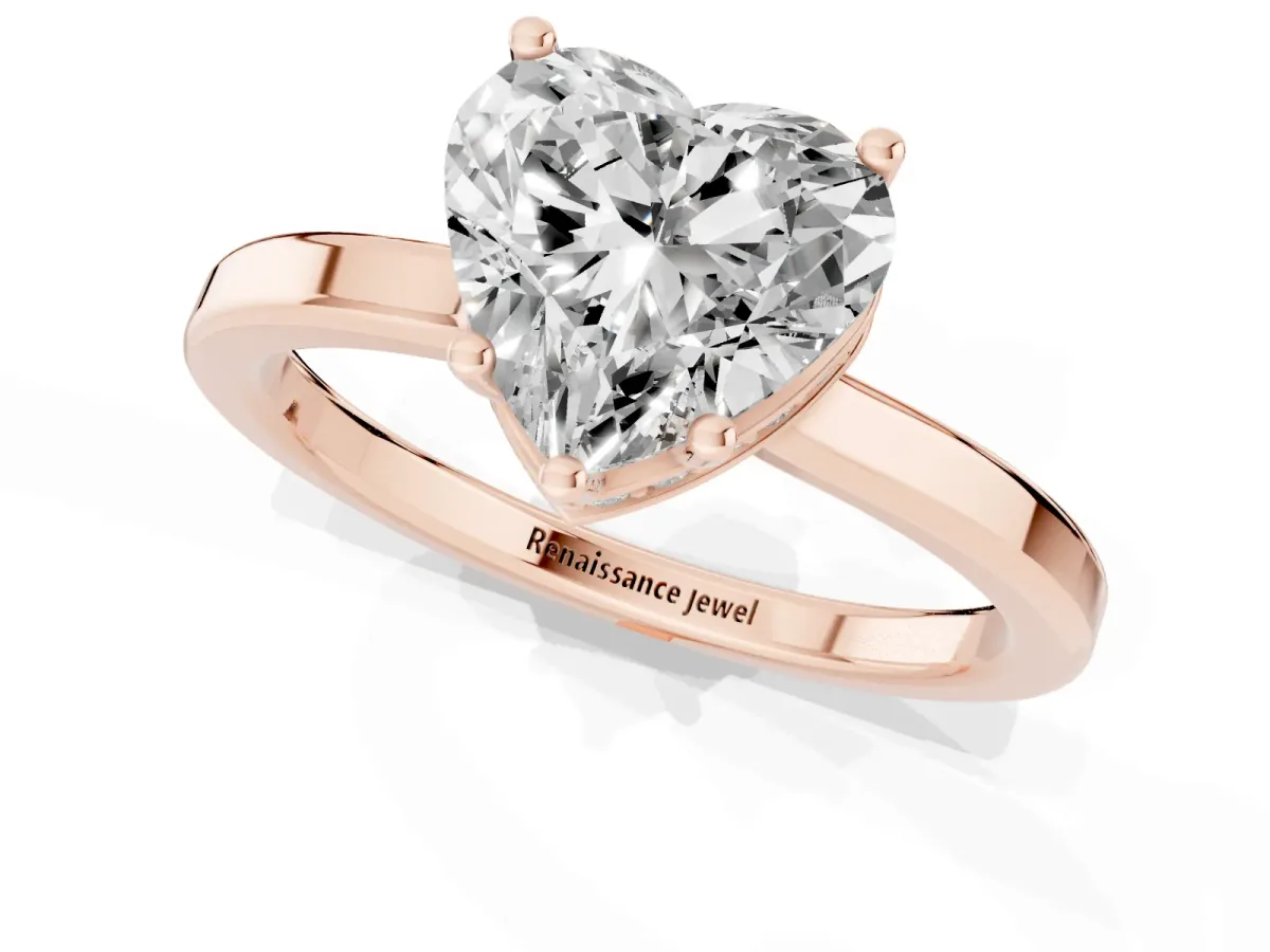 Heart Cut Cut Solitaire Engagement Ring with Four-Prong Setting on a Classic Band Rose gold