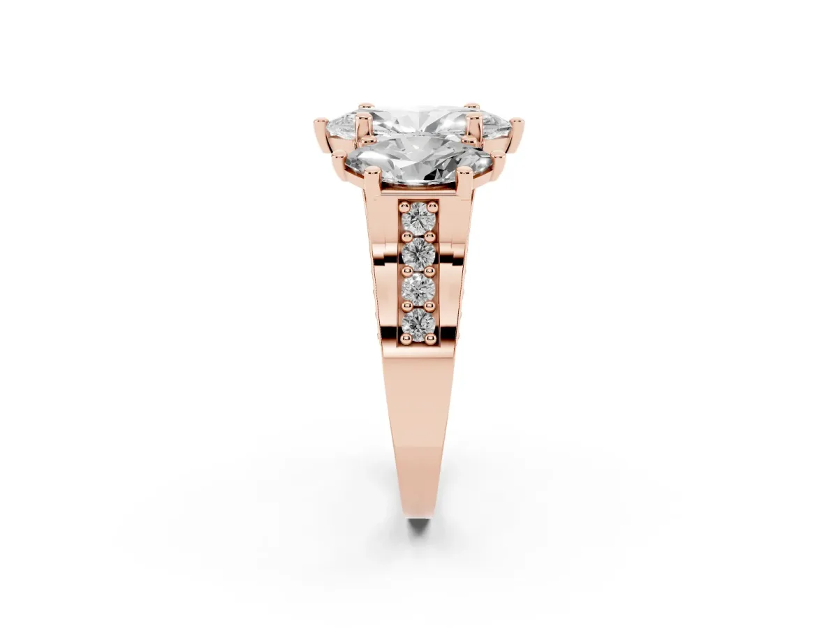 Marquise Cut Diamond Three-Stone Ring with Channel Set Band and Four-Prong Setting Rose gold