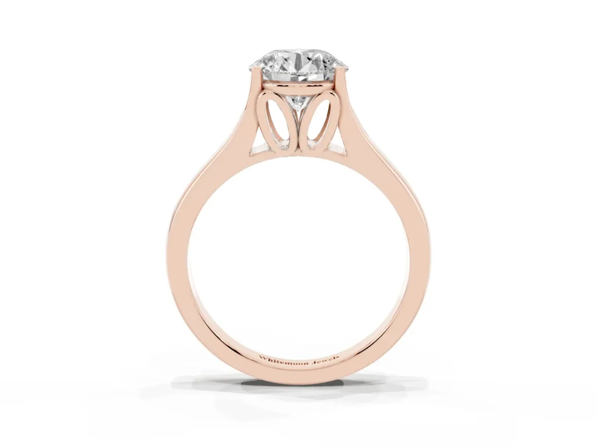 Round Cut Solitaire Diamond Ring with Cathedral Band and Four-Prong Setting Rose gold