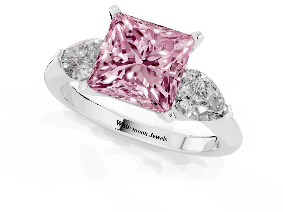 Fancy Pink Three-Stone Princess Cut Diamond Ring with Pear Side Stones and Four-Prong Setting Silver