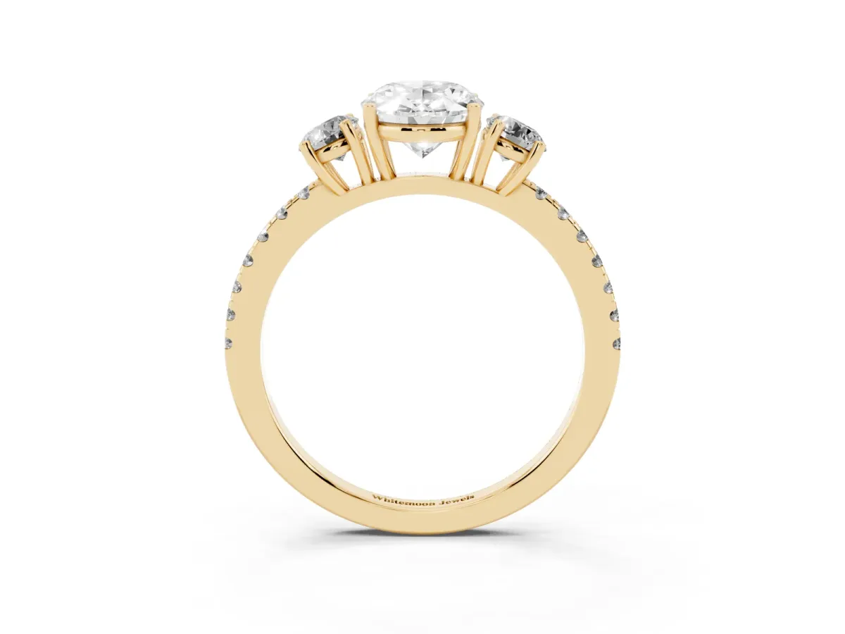 Three-Stone Oval Cut Cut Diamond Pavé Band with Prong Setting Yellow gold
