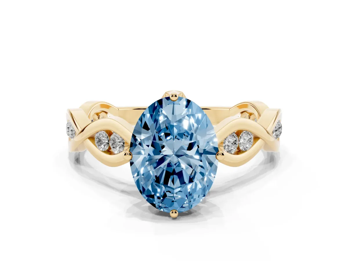 Fancy Blue Oval Cut Solitaire Twist Band with Leaf Prong Setting Yellow gold