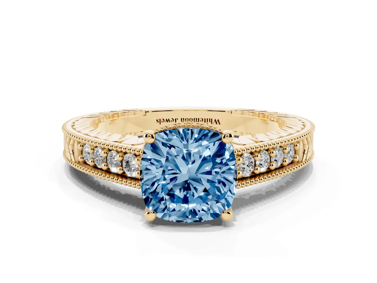 Fancy Blue Cushion Cut Solitaire Pavé Diamond Milgrain Engagement Ring with Four-Prong Setting Yellow gold