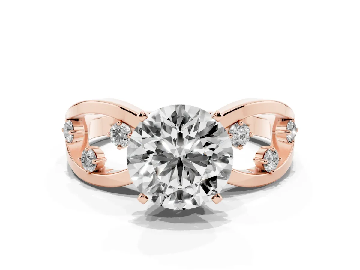 Round Cut Cut Solitaire Diamond with Side Stones on Criss-Cross Band and Four-Prong Setting Rose gold