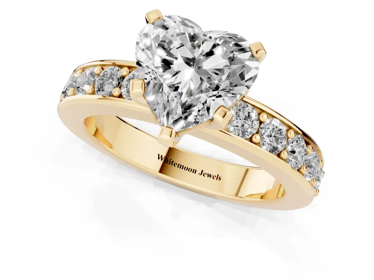 Heart Cut Diamond Engagement Ring with Channel Set Round Band and Prong Setting Yellow gold