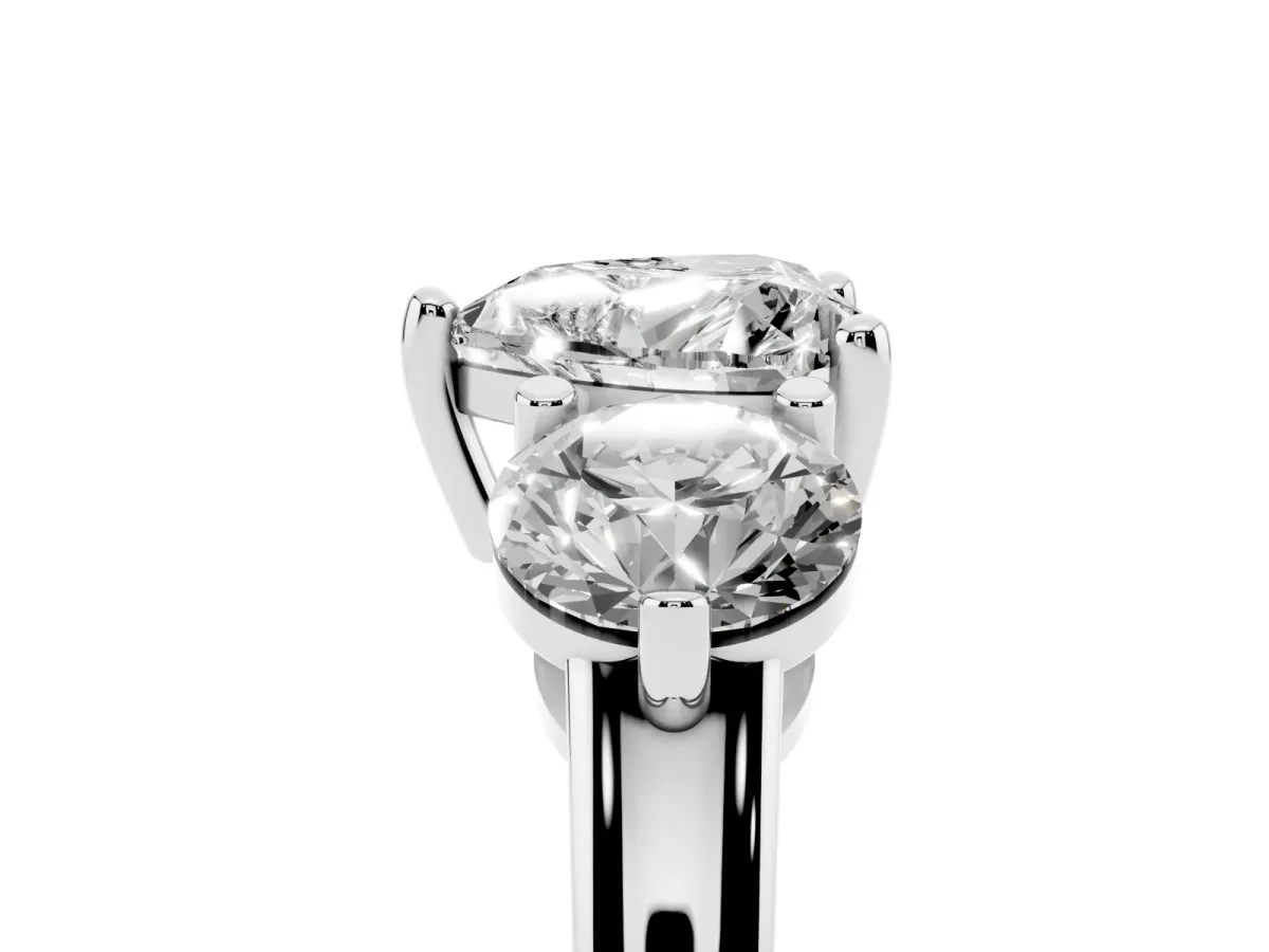 Three-Stone Heart Cut Brilliant Cut Solitaire Ring with Prong Setting on a Classic Band Silver