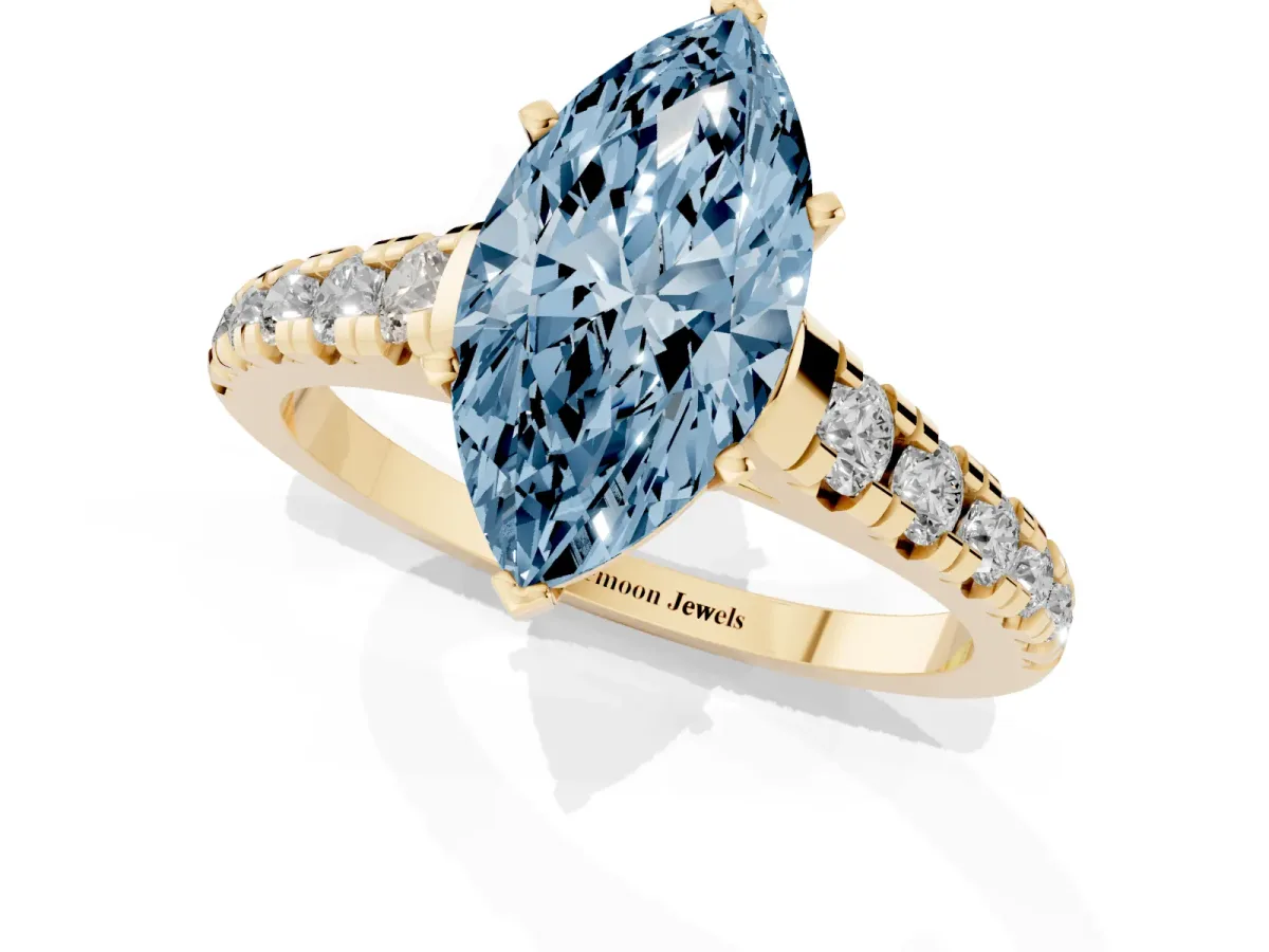 Fancy Blue Marquise Cut Diamond Cathedral Solitaire Ring with Round Pavé Band Yellow gold