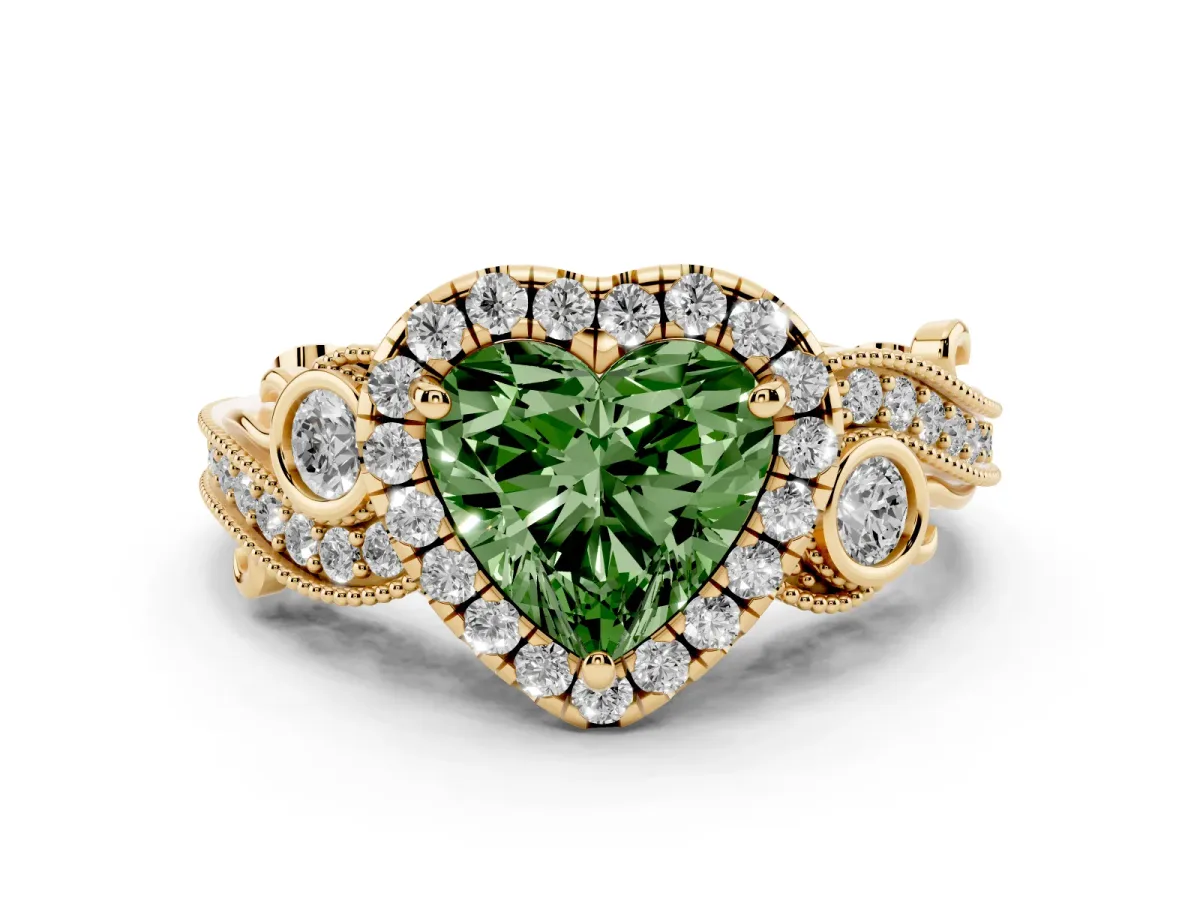 Fancy Green Heart Cut Halo Diamond Ring with Milgrain and Bezel Accents on a Split Shank Band Yellow gold