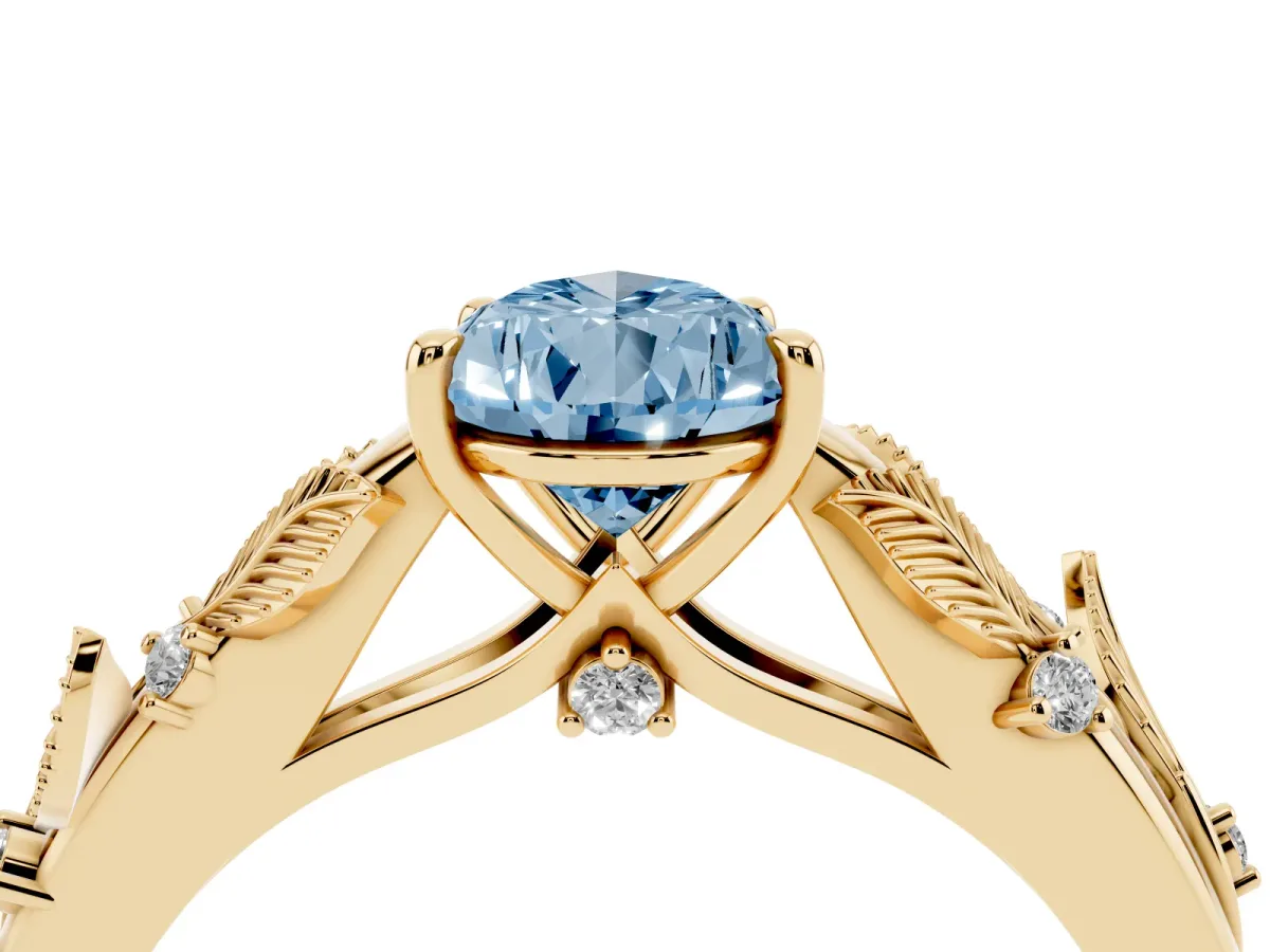 Fancy Blue Pear Cut Diamond Solitaire Ring with Leaf Motif Band and Four-Prong Setting Yellow gold