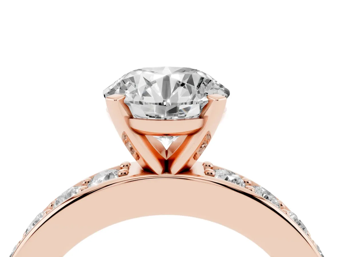 Round Cut Diamond Engagement Ring with Channel Set Round Band and Prong Setting Rose gold