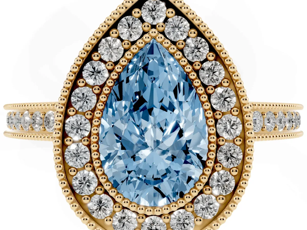 Fancy Blue Pear Cut Cut Halo Diamond Ring with Pavé Band and Milgrain Prong Setting Yellow gold