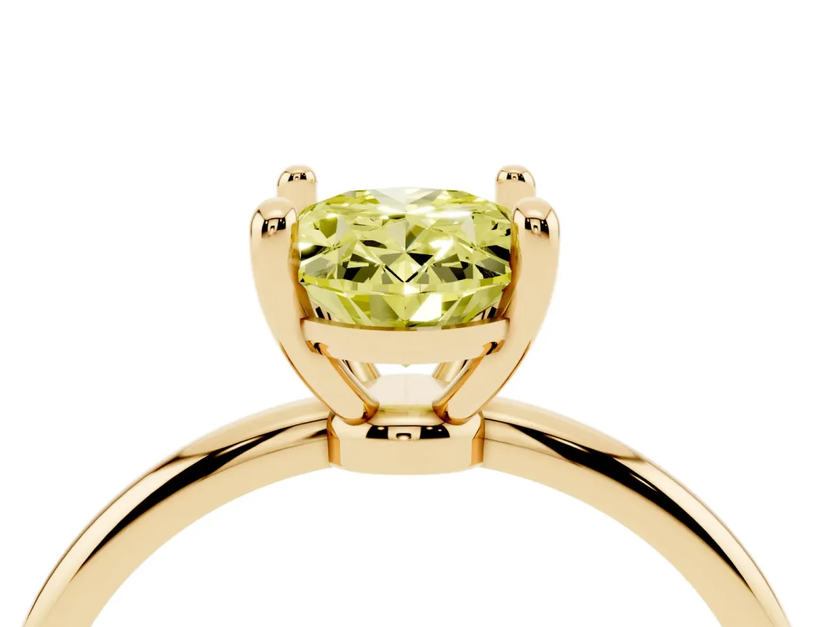 Fancy Yellow Oval Cut Solitaire Diamond Ring with 4-Prong Setting on a Classic Band Yellow gold
