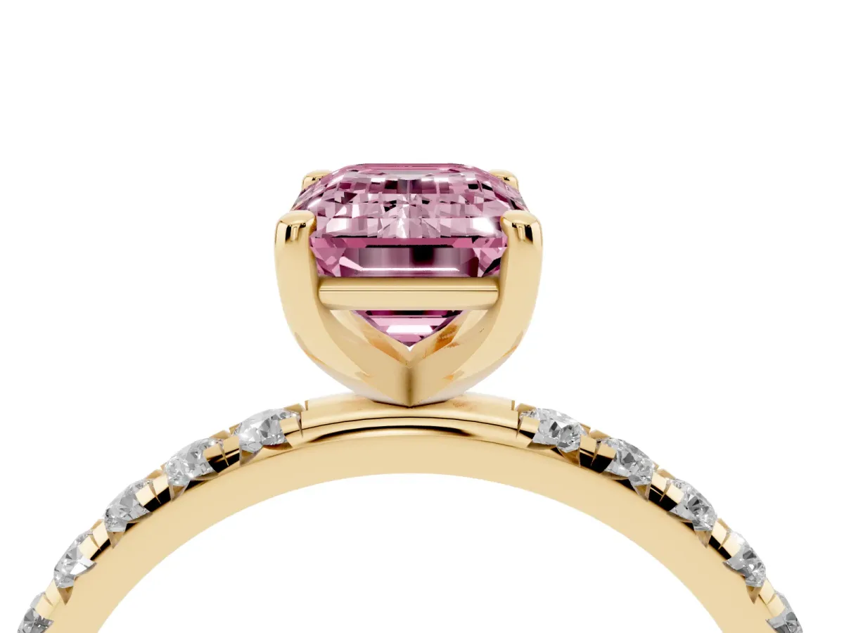Fancy Pink Emerald Cut Cut Diamond Solitaire Ring with Micro Pave Band and Four Prong Setting Yellow gold