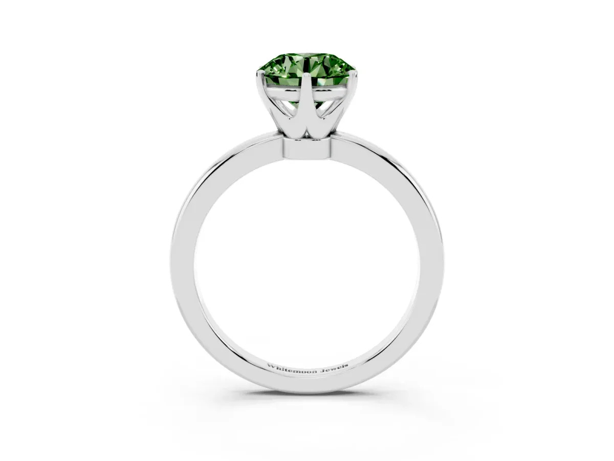 Fancy Green Round Cut Solitaire Diamond Ring with Six-Prong Setting on a Classic Band Silver