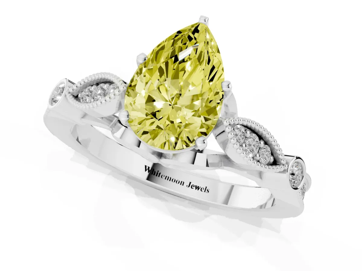Fancy Yellow Pear Cut Cut Diamond with Milgrain Marquise and Bezel Accents on a Solitaire Band with Prong Setting Silver