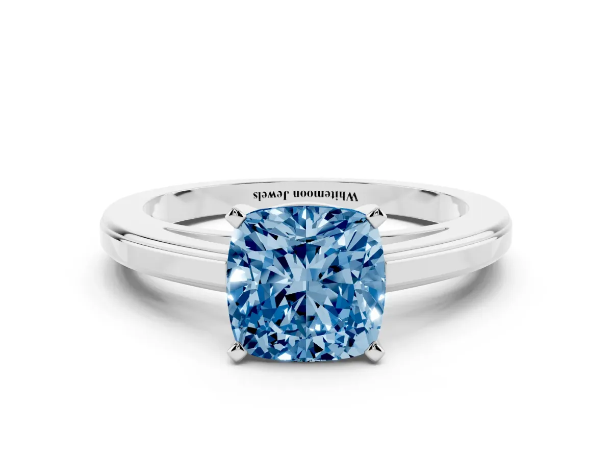 Fancy Blue Cushion Cut Solitaire Diamond Ring with Four-Prong Setting and Classic Band Platinum