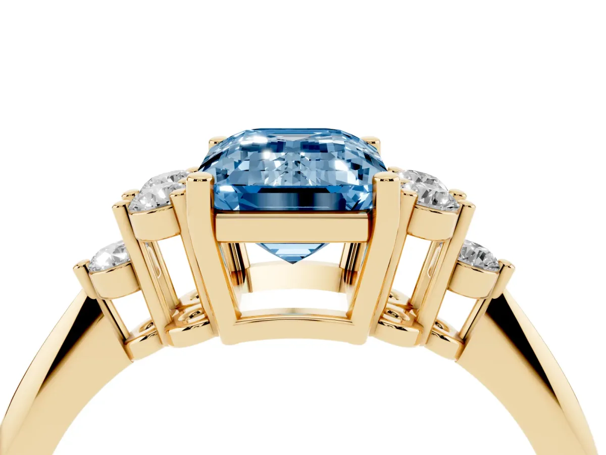 Fancy Blue Emerald Cut Cut Diamond Cluster Ring with Solitaire Band and Four-Prong Setting Yellow gold