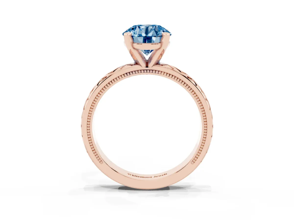 Fancy Blue Round Cut Solitaire Diamond Ring with Milgrain and Black Enamel X Pattern Band Rose gold