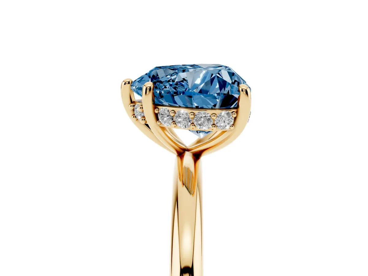 Fancy Blue Heart Cut Solitaire Diamond Ring with a Classic Band and Four-Prong Setting Yellow gold