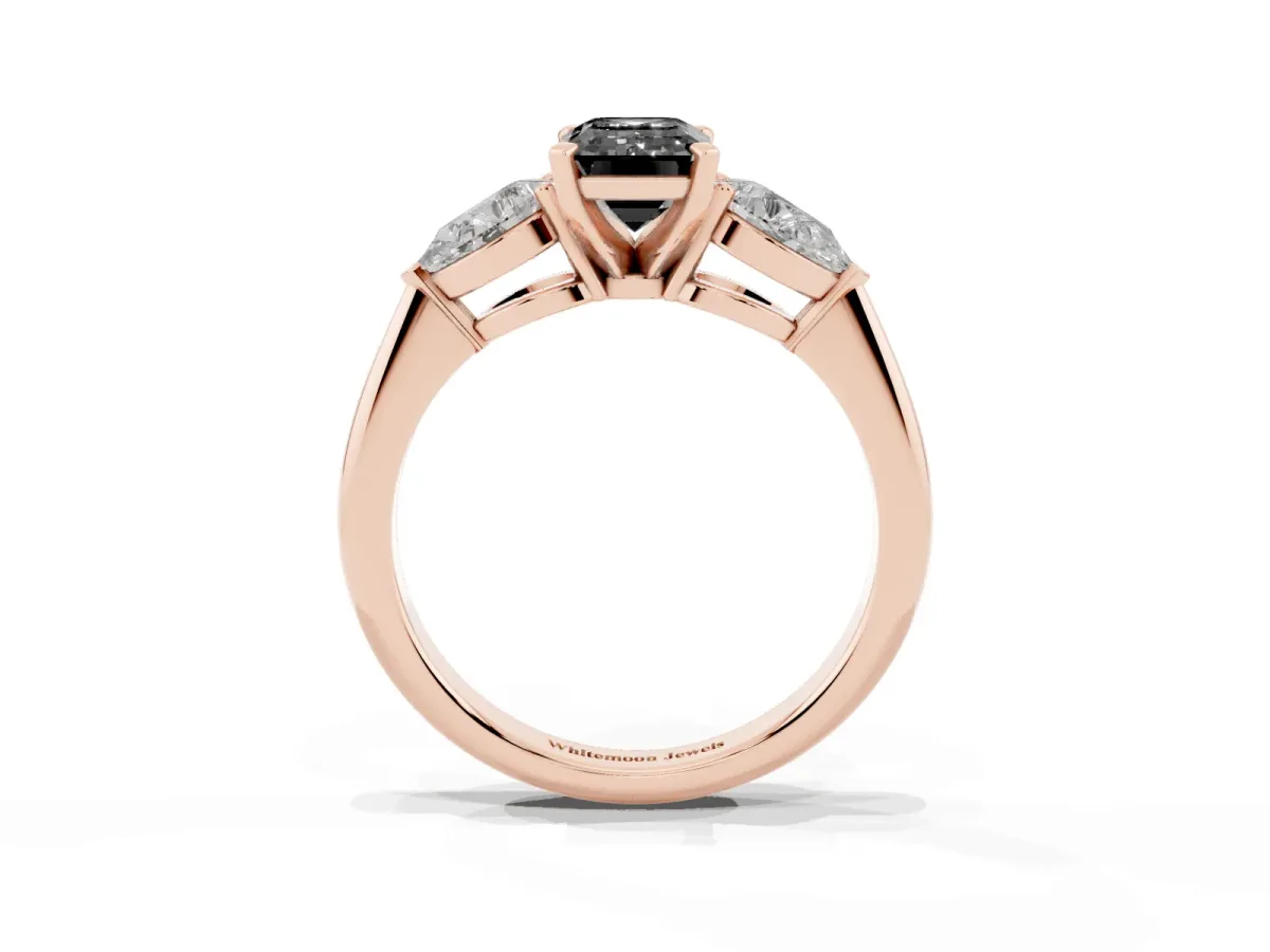Fancy Black Three-Stone Emerald Cut Diamond Ring with Pear Side Stones and Four-Prong Setting Rose gold