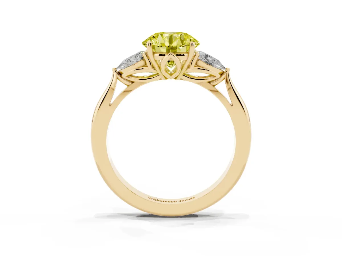 Fancy Yellow Three-Stone Round Cut Diamond Ring with Pear Side Stones in Four-Prong Setting Yellow gold