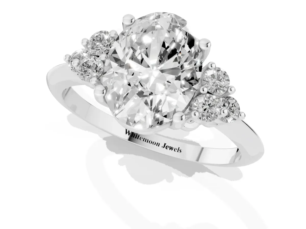 Oval Cut Cut Diamond Cluster Ring with Solitaire Band and Four-Prong Setting Silver