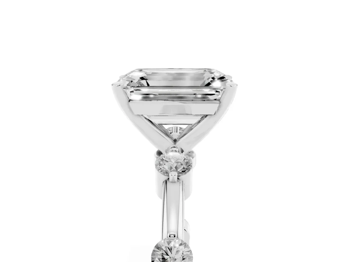 Emerald Cut Solitaire Diamond Ring with Bezel Set Side Stones and Prong Setting Platinum