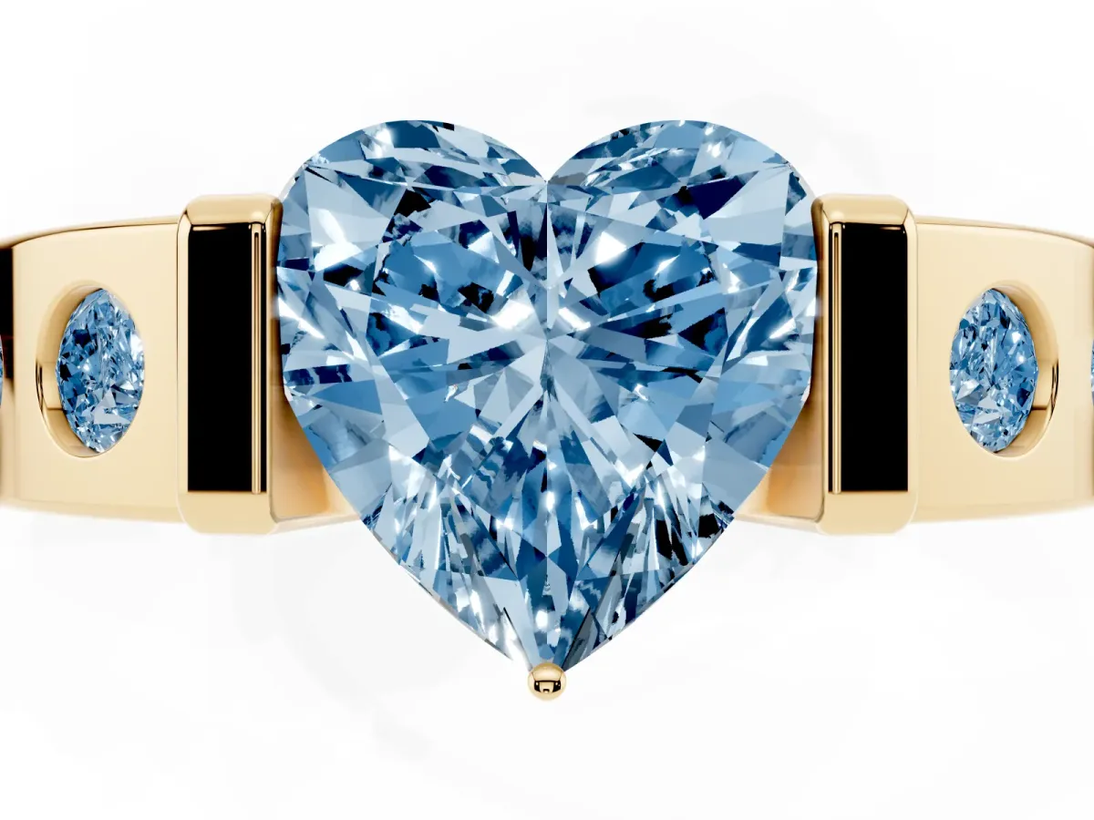 Fancy Blue Heart Cut Brilliant Channel-Set Diamond Ring with Bezel Prong Setting Yellow gold