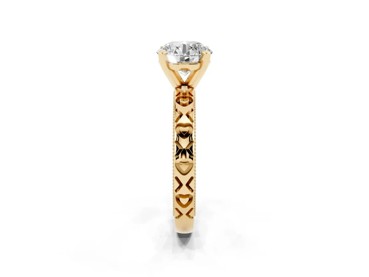 Round Cut Solitaire Diamond Engagement Ring with XO Engraved Band and Four-Prong Setting Yellow gold