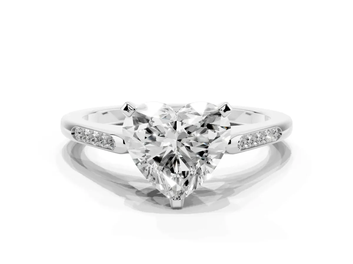 Heart Cut Diamond Solitaire Ring with Channel Set Round Band and Prong Setting Silver