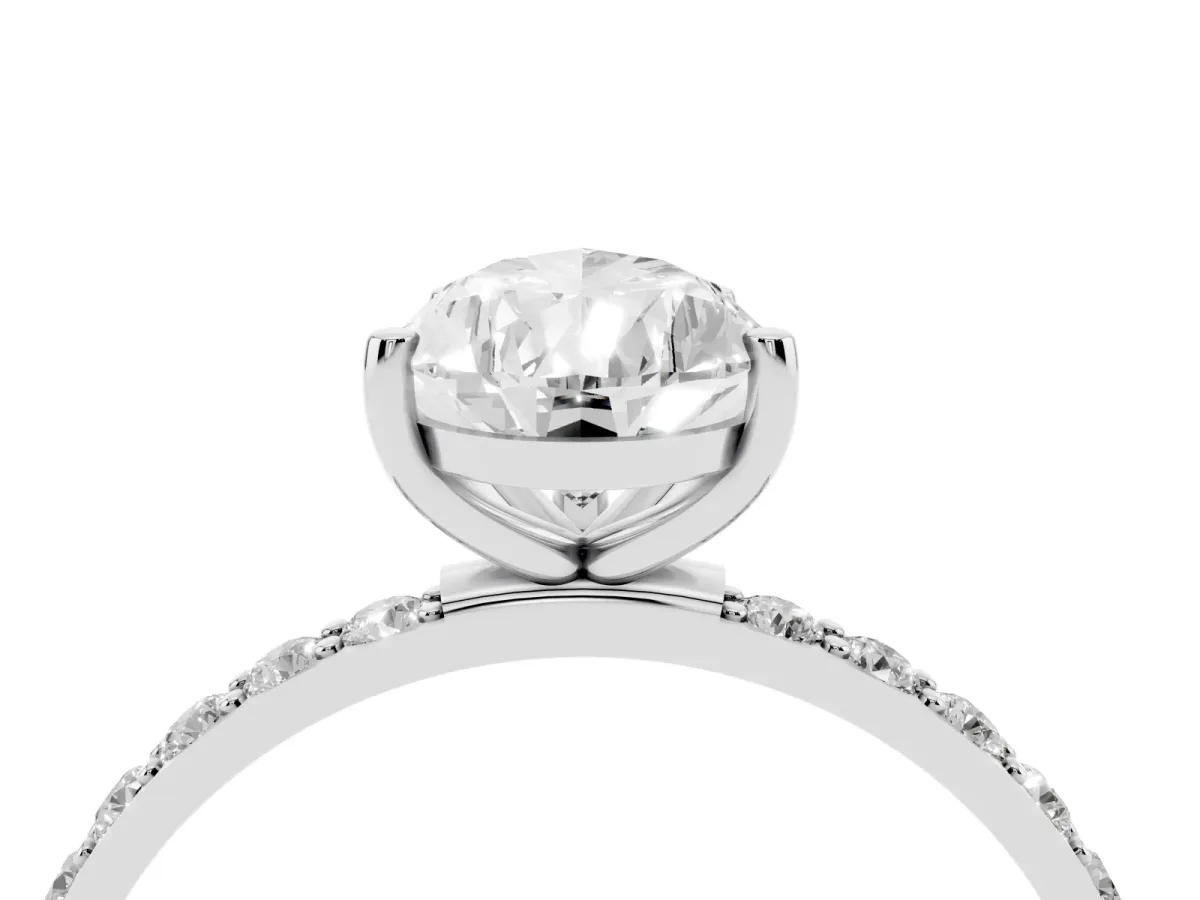Pear Cut Diamond Solitaire Ring with Round Pavé Shoulders and Prong Setting Platinum